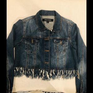 Distressed denim jacket.